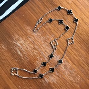 Silver and black long necklace